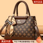 First-layer cowhide handbag 2025 new modern style gift bag for women, middle-aged casual bag